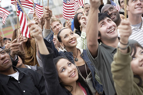 People waving American flags