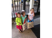 Students with their bags, ready for the day.