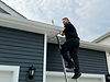 luis ubinas inspecting roof
