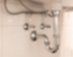 pipes under the bathroom sink