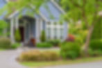 blue house with nice front garden