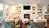 white living room with fire in fire place