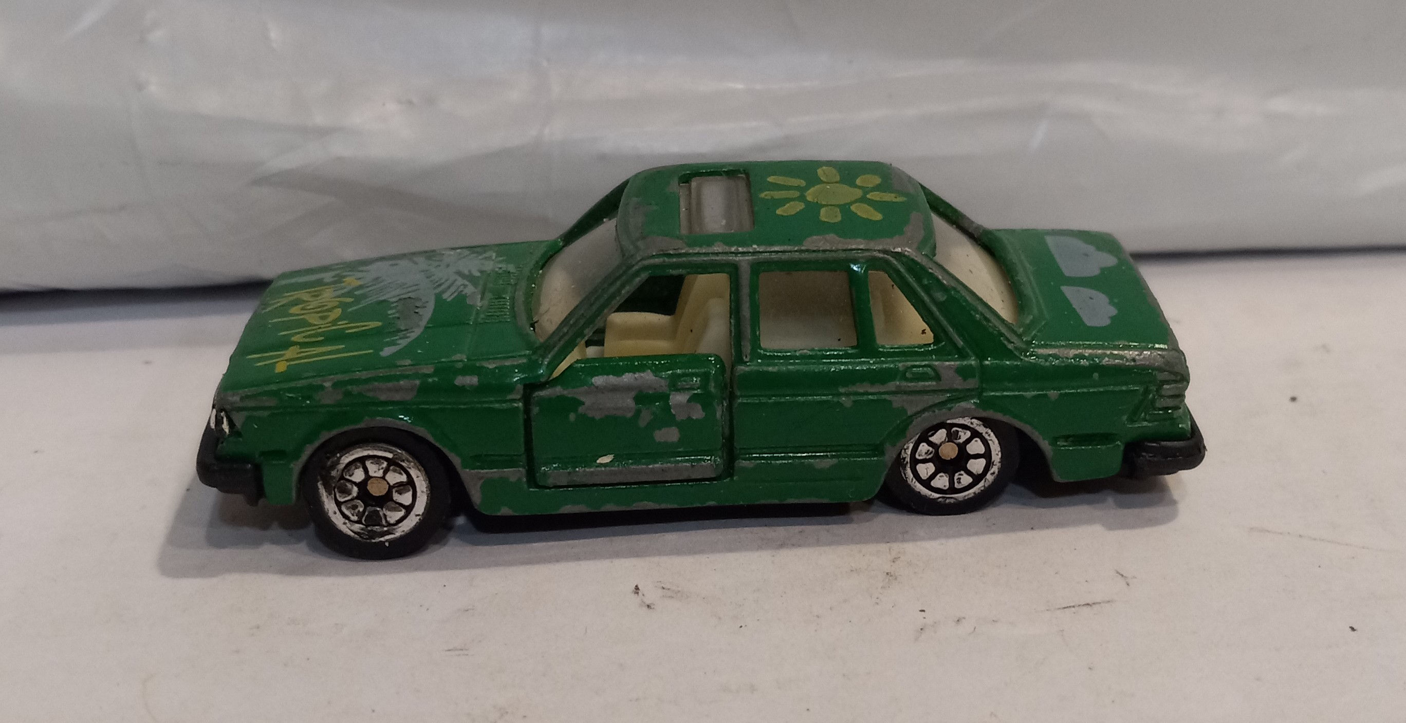 2 Door Dark Green Sedan Car