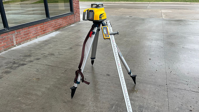 Laser with Tripod and Grade Rod