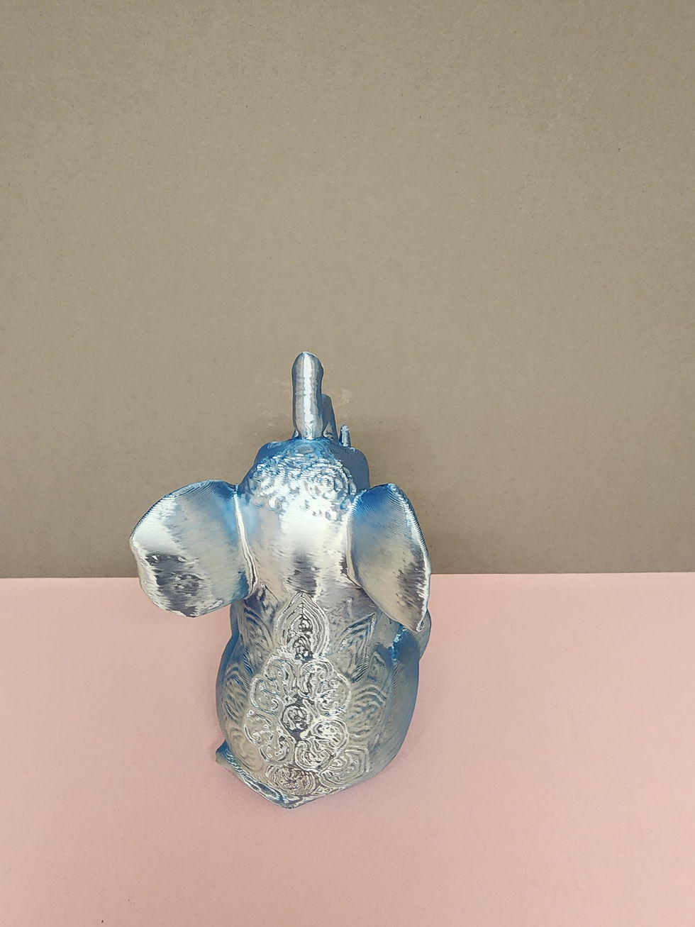 Thumbnail: 3D printed medium baby sitting elephant back with designs