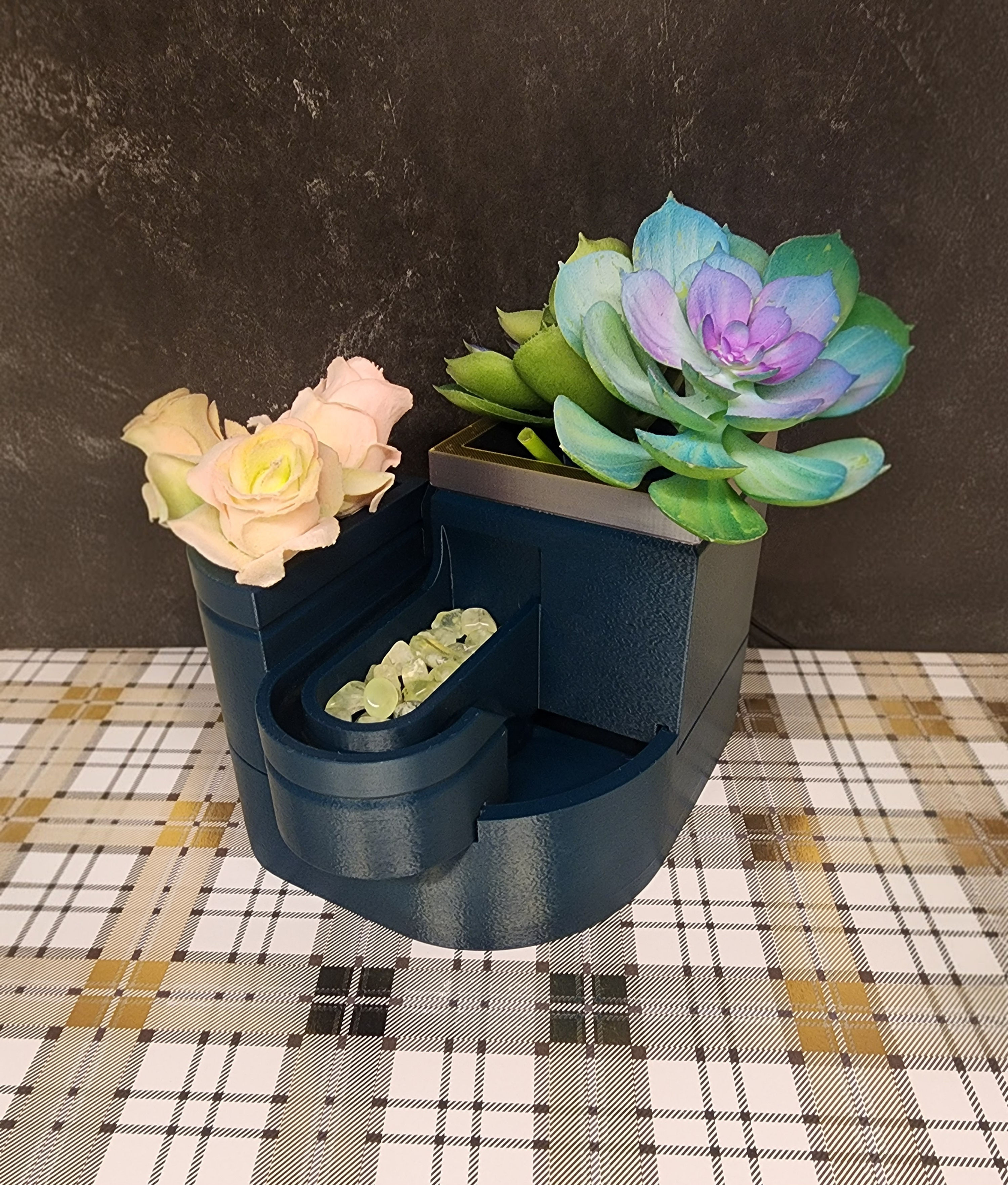 3D printed water fountain with places for foliage and pebbles if desired
