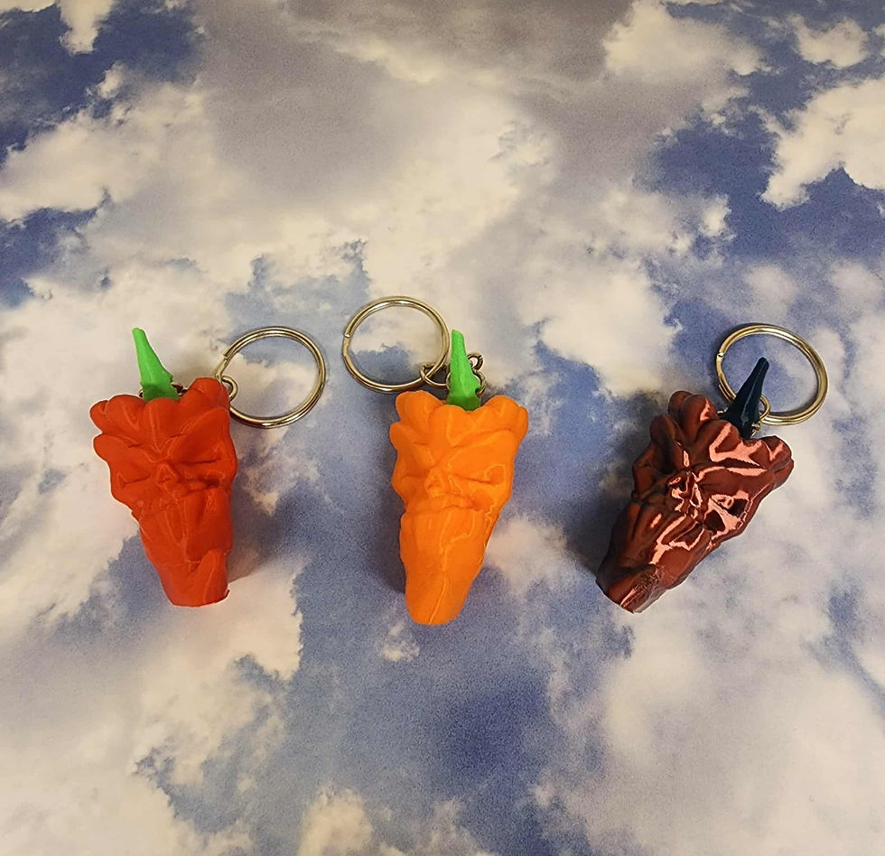 3D printed chili pepper with face keychain