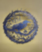 3D printed wall art of a raven perched inside a thorny wreath