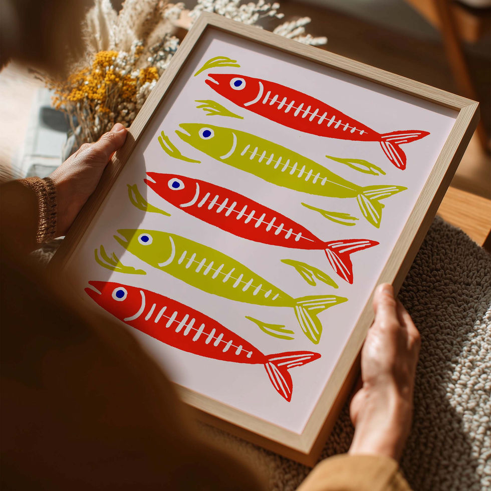 Modern art print featuring four red and yellow fish in a bold graphic style