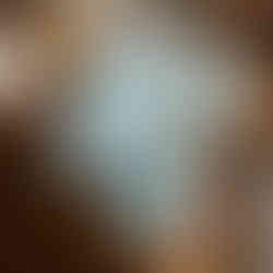 Watercolour art print of three small boats floating on soft blue water.