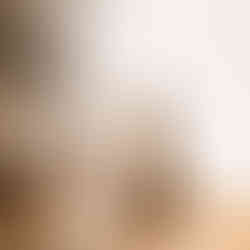 Watercolour art print of a bunny wearing a pink polka-dot bow, surrounded by soft floral details.