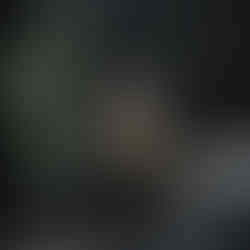 Bold abstract portrait inspired by cubism, featuring layered geometric forms and modern colour contrasts.