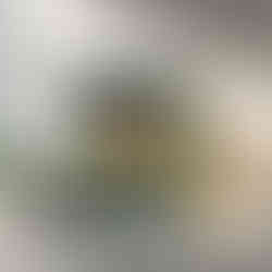 Woman in a white dress gently swinging over water in a sun-dappled forest – tranquil and romantic nature-themed art print.