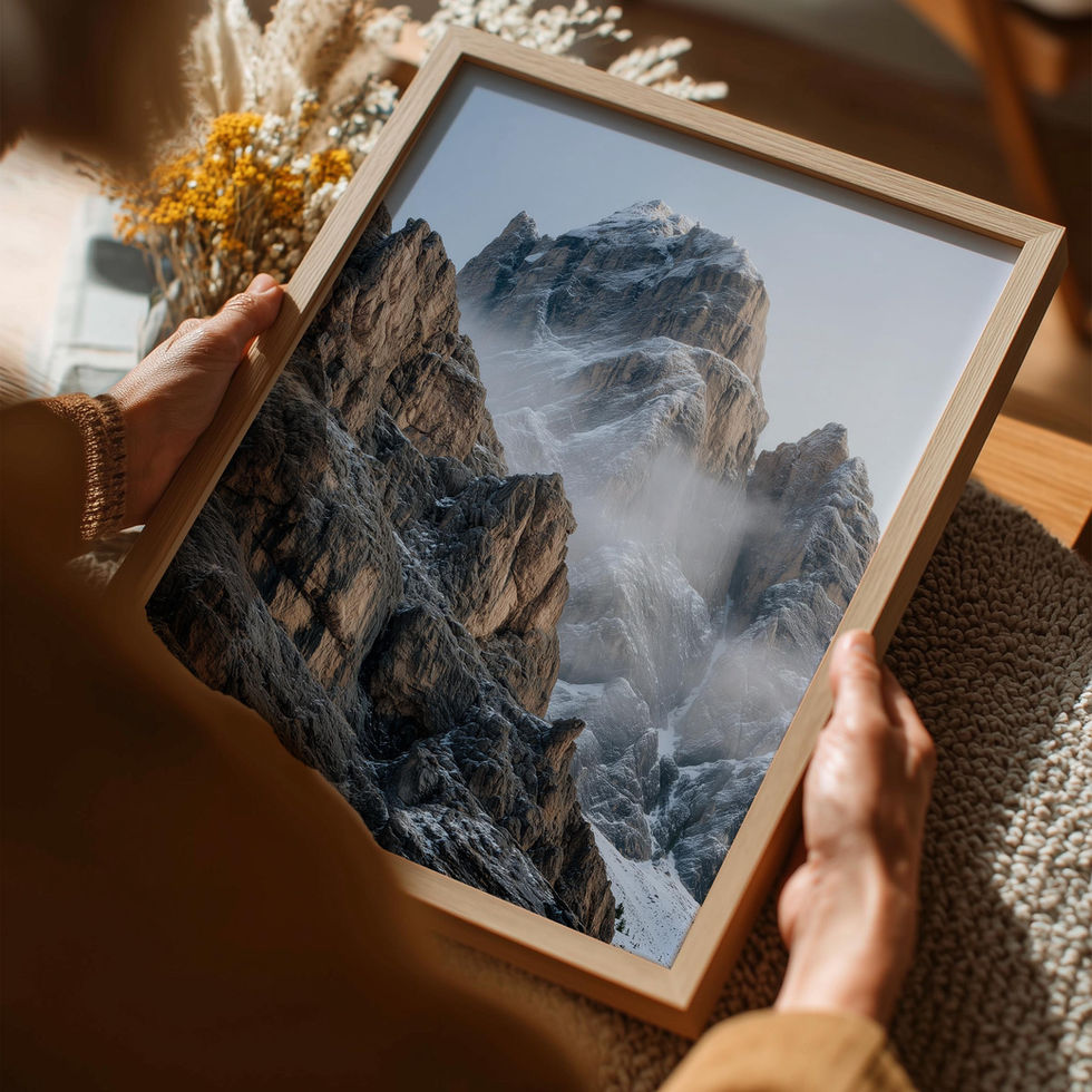 Majestic mountain art print with snow-dusted peaks and mist drifting through rocky cliffs.