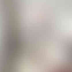 Watercolour painting of a woman under a red-leafed tree with flowing brushstrokes.