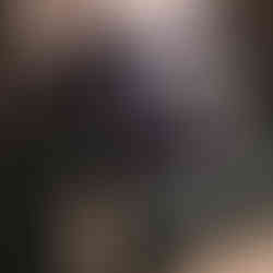 Grey cat yawning in a grassy field with the moon in the background art print.