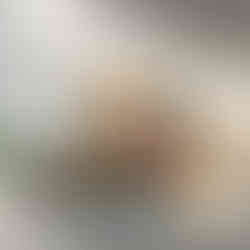 Abstract hills in rich teal, mustard, and coral tones beneath a glowing orange sun – colourful modern landscape art print.