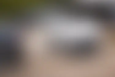 enclosed trailer being towed by a car