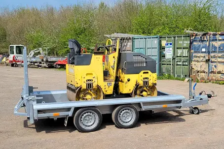 trailer with heavy equipment on it