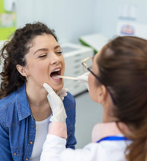 female-patient-opening-her-mouth-doctor-look-her-throat-otolaryngologist-examines-sore-thr