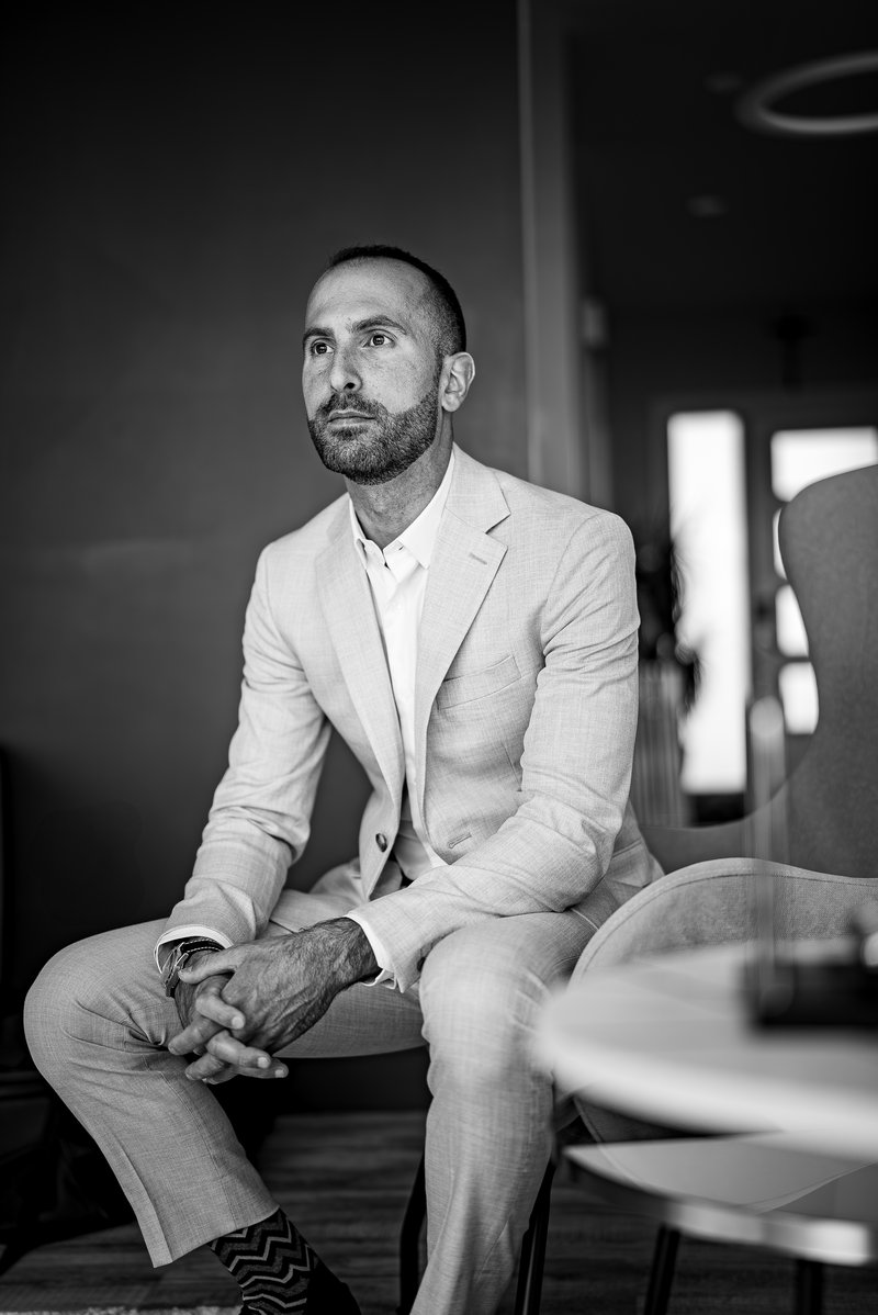 Charbel Daniel seated, black and white portrait