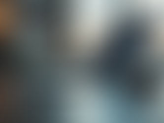 modern office desk with a laptop and AI assistant device