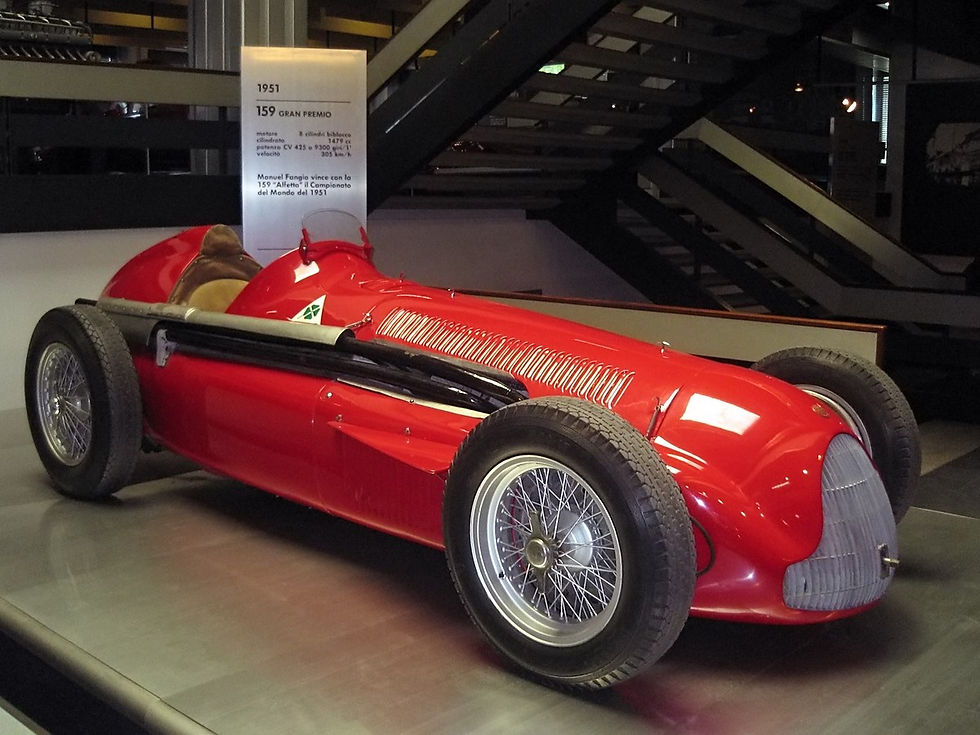 The red Alfa Romeo 159 Formula 1 car on display.