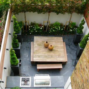 small formal garden with bbq