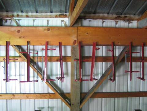 Clamp tools hanging in warehouse
