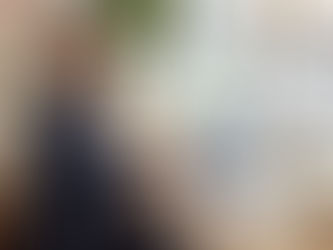 rofessional female accountant reviewing rental property financial documents in a modern office.