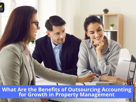 Property management team discussing financial reports with an outsourced accounting professional.