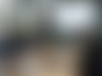 Property managers reviewing rental property performance charts and financial dashboards in a modern office.