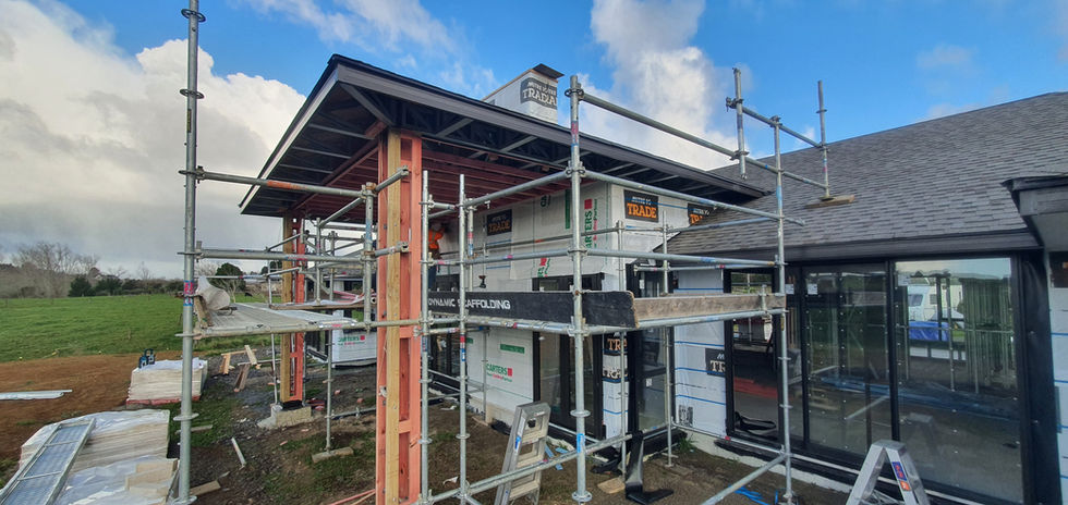 New Build home in Auckland with a Residential house under construction with scaffolding; KARAKA NEW BUILD, Auckland Builder.