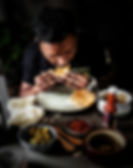 Eating Dhalpuri Roti