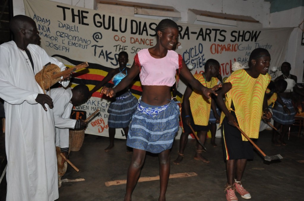 The Gulu Theatre Artists performing a traditional Acholi dance, Larakaraka