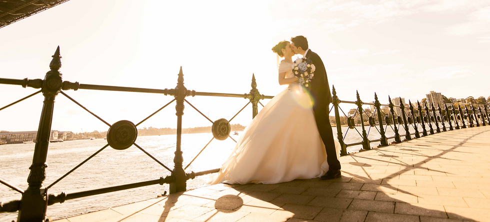 Bride and groom kissing at wedding in Sydney, Australia