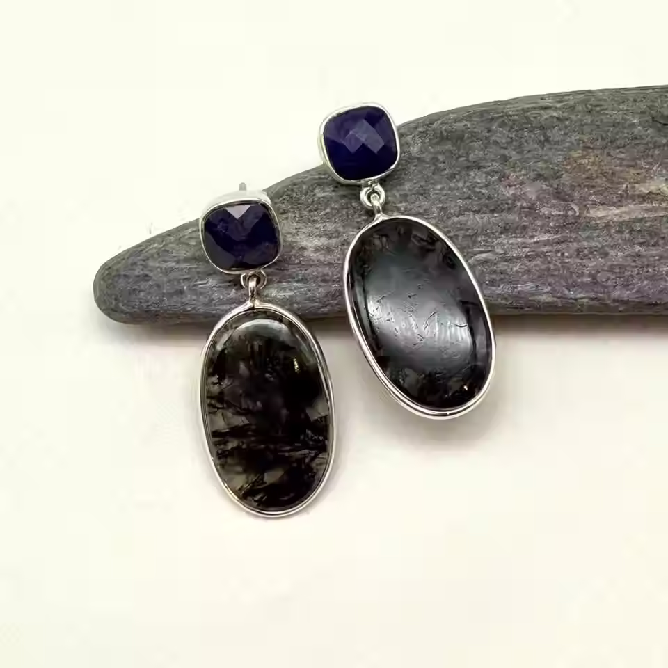 Sterling silver drop earrings with square blue sapphires and oval moss agate stones.