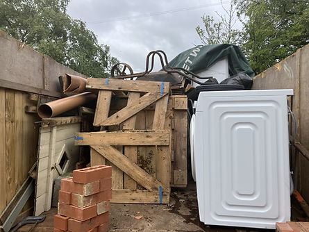 waste being loaded on house clearance shropshire