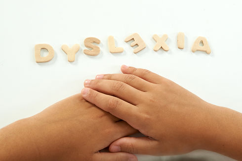 hands-of-a-girl-form-the-word-dyslexia-525913091_6016x4016.jpeg