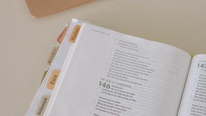 Bible and a laptop
