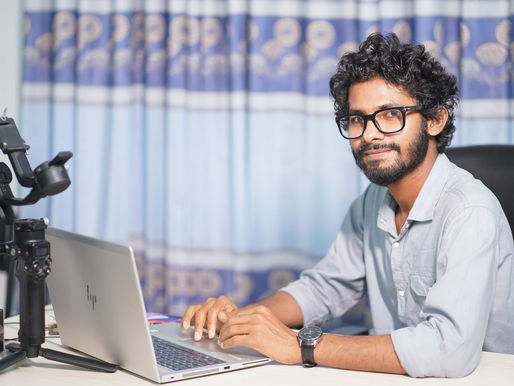 Web developer working on a laptop during a Wix website redesign