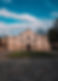 The Alamo, historic landmark, under a partly cloudy sky