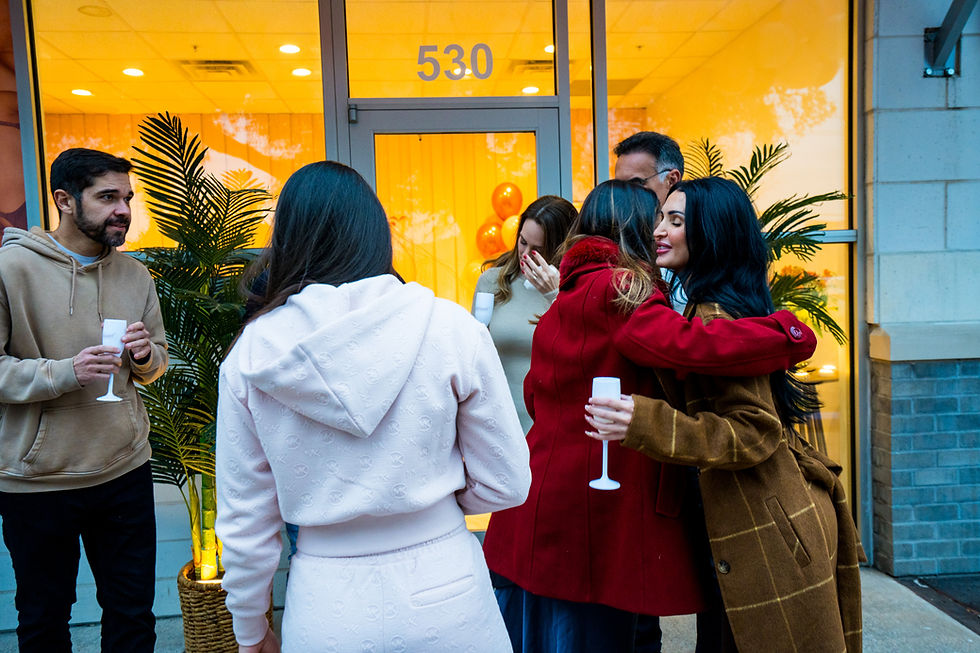 Guests celebrating at an Austin business grand opening