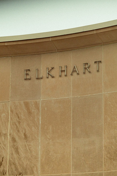 Elkhart Public Library name  on the stone exterior wall of the downtown Elkhart library building.