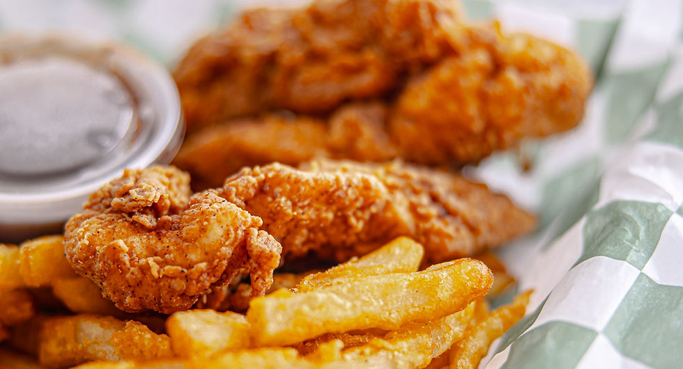 A basket with tenders and fries.