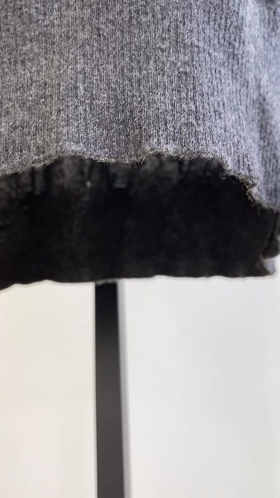 Thumbnail: Ebony Ivory Knit Tunic Top with Decorative Pin