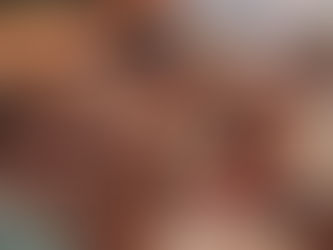 A grazing table with cheeses, crackers and strawberries