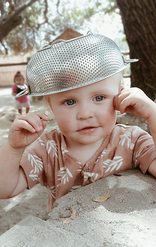 kyra with colendar on head.jpg