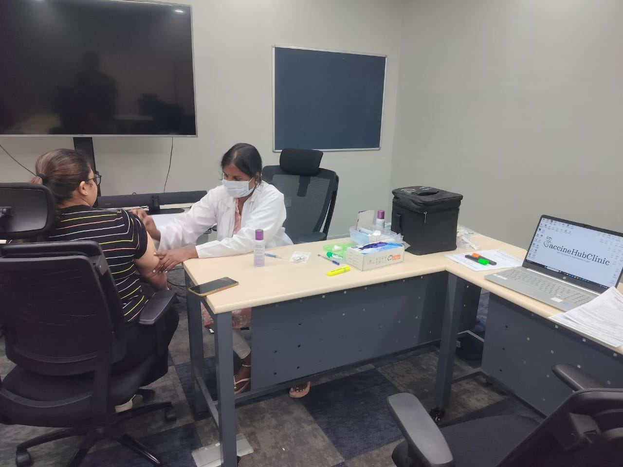 Vaccination station set up in an office