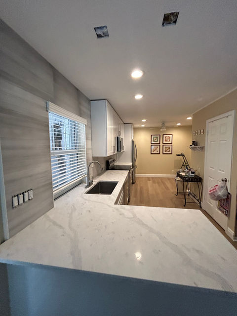 Luxury kitchen remodel in North Palm Beach by Love By Design featuring modern cabinetry, premium finishes, and custom layout